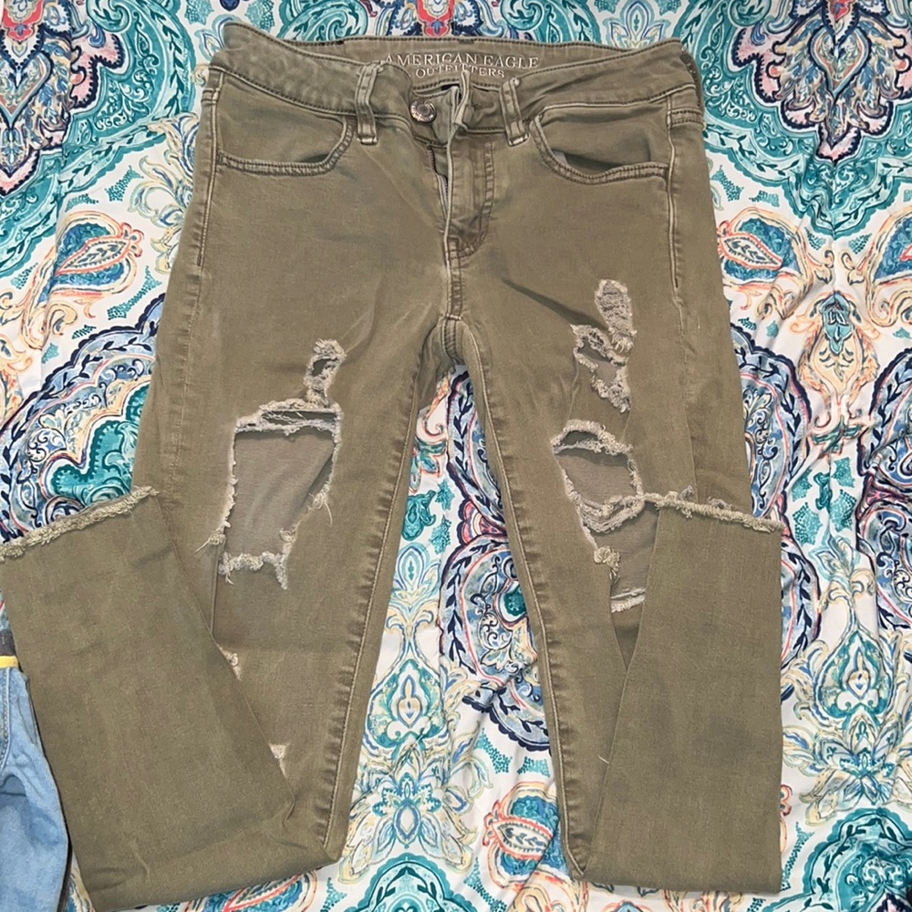 Green American Eagle Ripped Skinny Jeans